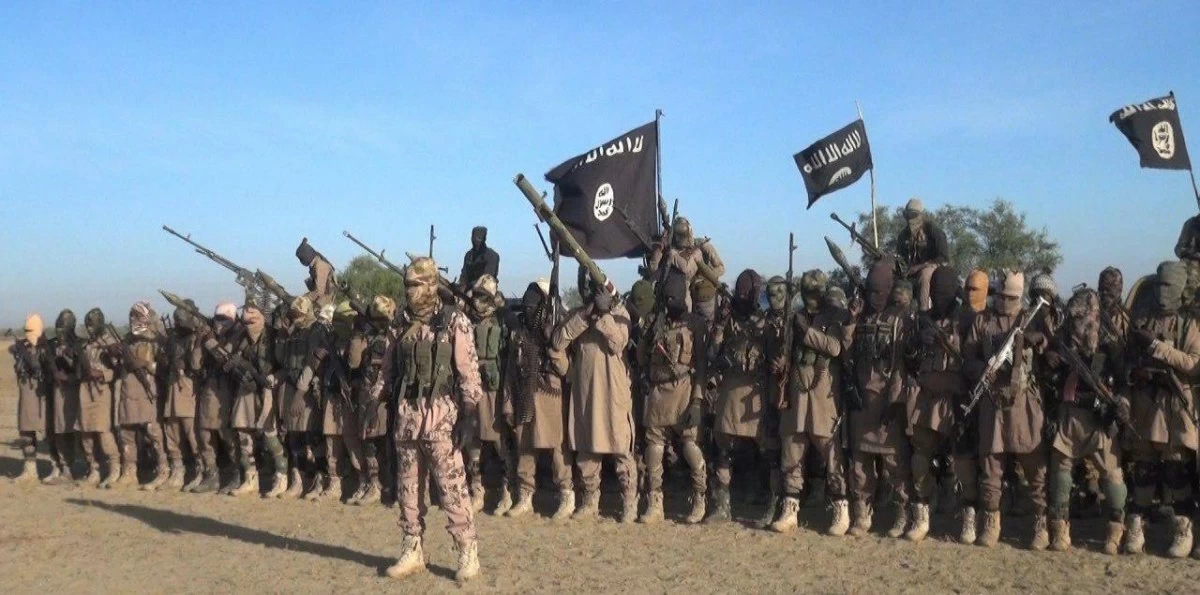 An image released by ISIS propaganda agency Amaq that it said showed members of Islamic State's West Africa Province affiliate pledging bayah to new ISIS leader Abu Ibrahim al-Hashimi al-Qurayshi, November 7, 2019 (AFP photo)