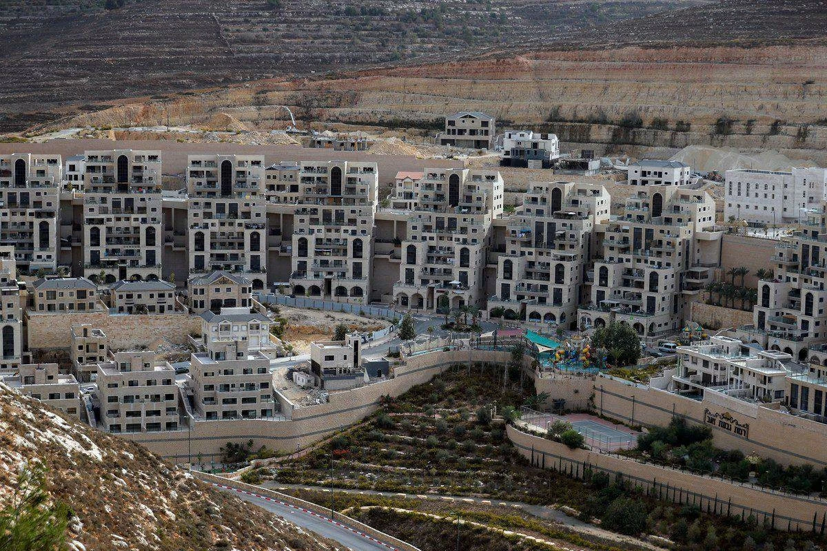 A general view shows construction work in the Israeli settlement in the occupied West Bank, on 28 October 2021 (AFP photo)