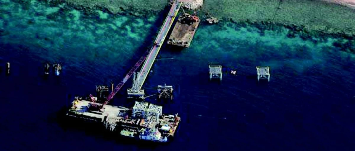 An aerial view of the liquefied natural gas terminal in Aqaba. Minister of Government Communication Mohammad Momani says that the Energy Ministry ‘swiftly’ shifted to heavy fuel oil and diesel to keep the national grid running amid rising regional tensions (File photo)