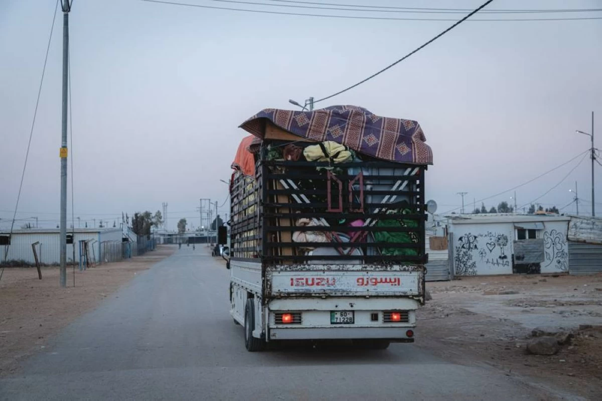 In this undated photo, a truck loaded with refugees’ belongings is seen departing from Zaatari Camp heading to Syria.
(UNHCR photo)
