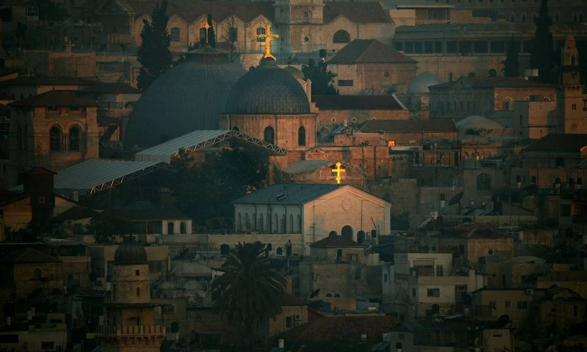 A picture shows the Church of the Holy Sepulchre at sunrise in the Old City of Jerusalem (AFP  photo)
