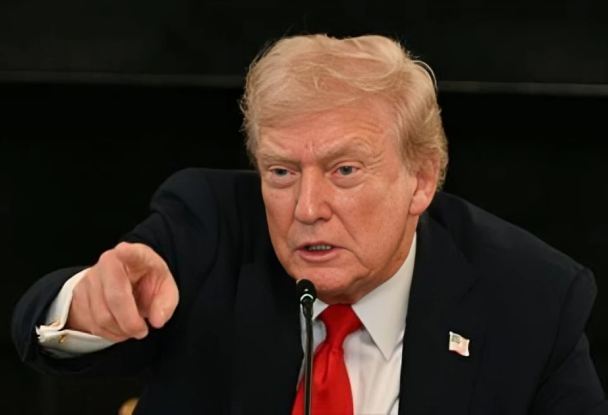 US President Donald Trump fields a question from a reporter during a roundtable about Antifa in the State Dining Room of the White House in Washington, DC, on October 8, 2025 (AFP photo)
