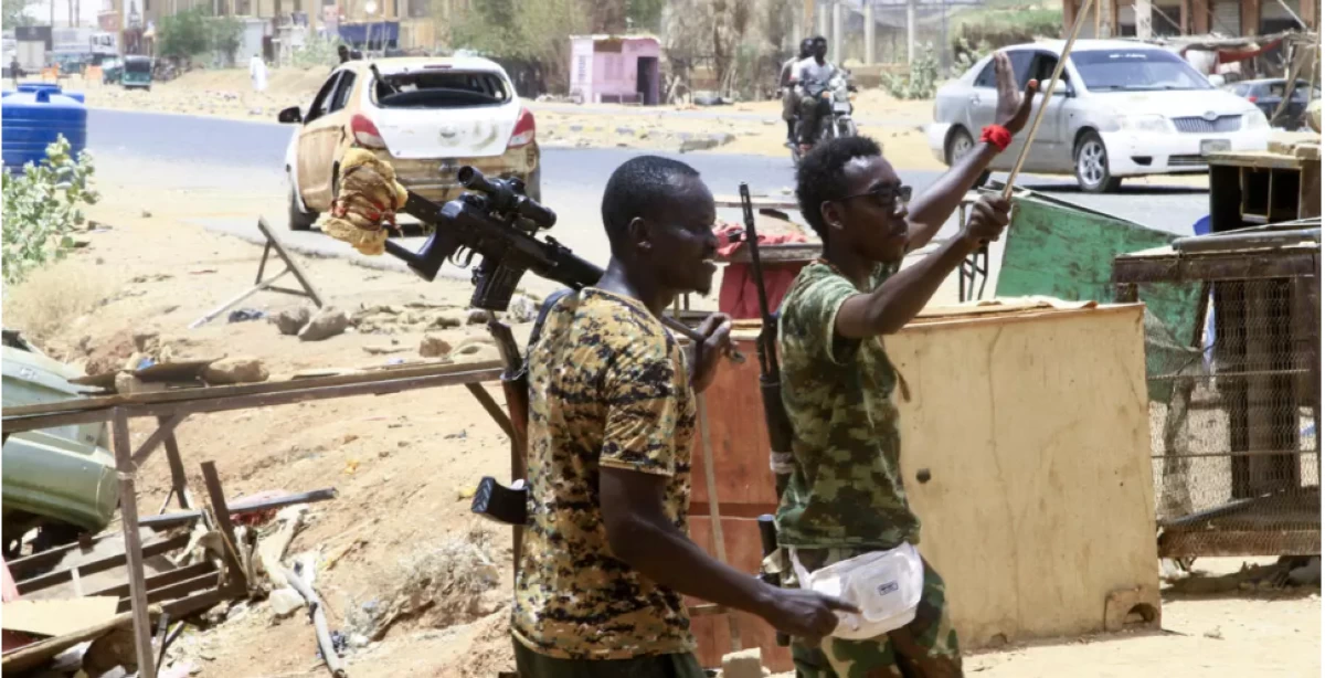 Sudanese army soldiers celebrate in Salha, south of Omdurman, two days after the Sudanese army recaptured it from the paramilitary Rapid Support Forces on May 22, 2025 (AFP photo)