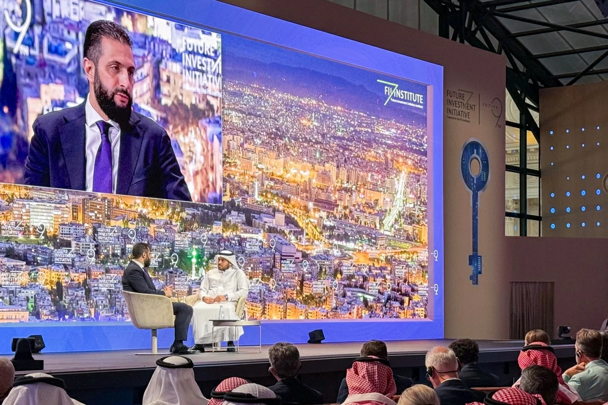 Syria's interim President Ahmed al-Sharaa speaks during the Future Investment Initiative (FII) conference in Riyadh on Wednesday (AFP photo)