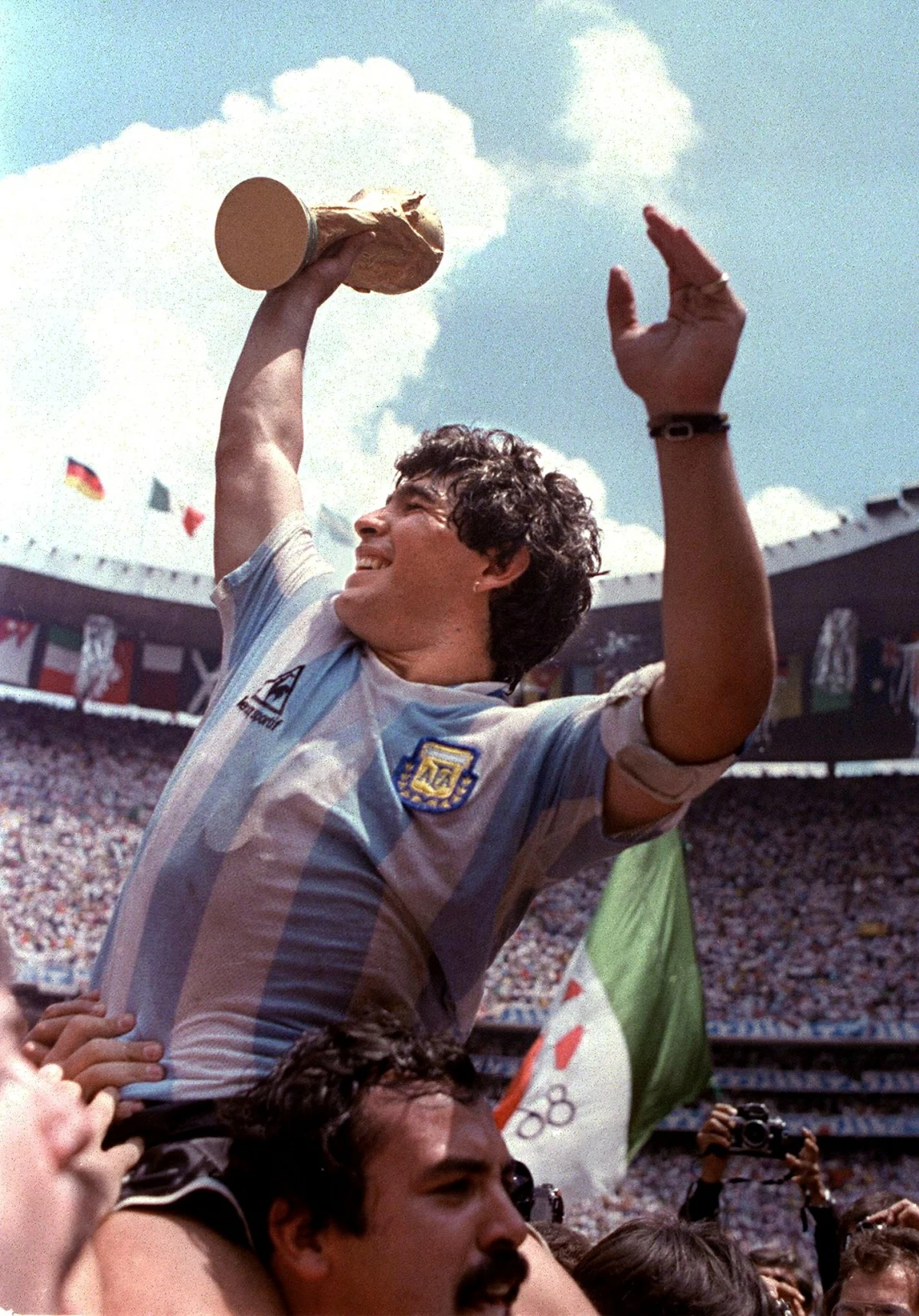 Diego Maradona raises the World Cup trophy after Argentina won the 1986 Mexico City World Cup in June 1986  (AFP file photo)