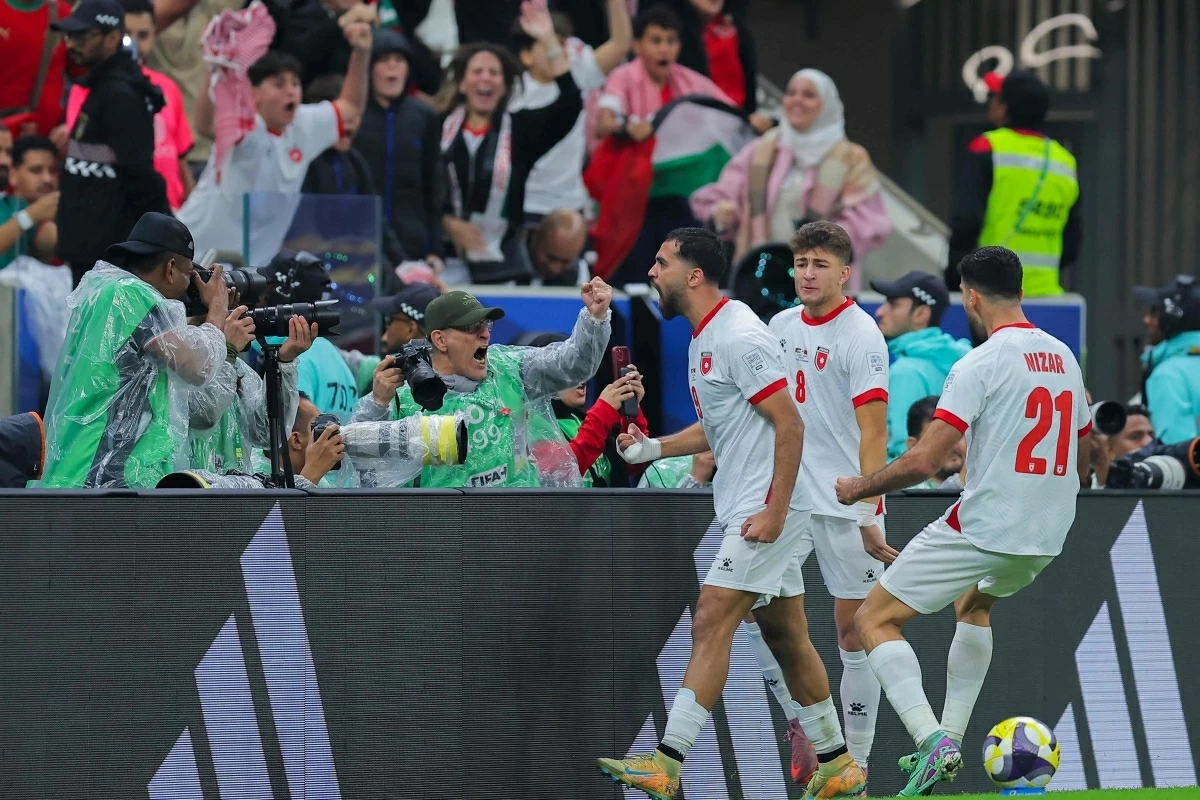 Jordan's forward #9 Ali Olwan celebrates scoring his team's first goal during the FIFA Arab Cup 2025 final football match between Jordan and Morocco at the Lusail Stadium Stadium, in Lusail on December 18
(AFP photo)