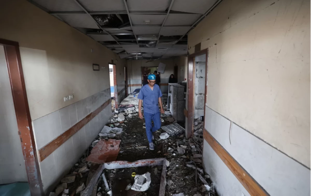 Palestinian hospital staff inspect the destruction inside Nasser Hospital in Khan Yunis in the southern Gaza Strip, following an Israeli strike on May 13, 2025 (AFP photo)