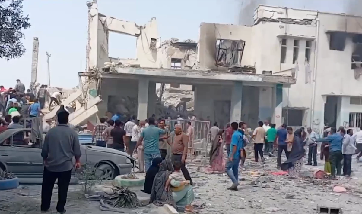 This image grab taken from Iranian state television broadcast on February 28, 2026 shows what it says is the site of deadly US and Israeli strikes that hit a girls' elementary school in Minab, in the southern Iranian province of Hormozgan near the strategic sea route of the Strait of Hormuz  (AFP photo)