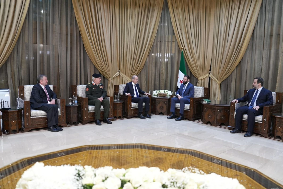 Deputy Prime Minister and Minister of Foreign Affairs, Ayman Safadi, along with Chairman of the Joint Chiefs of Staff Maj. Gen. Yousef Huneiti and General Intelligence Department Director Maj. Gen. Ahmad Husni, meet on Thursday with Syrian President Ahmad Al Sharaa, in the presence of Syrian Foreign Minister Asaad Al Shaibani (Photo courtesy of Foreign Ministry)