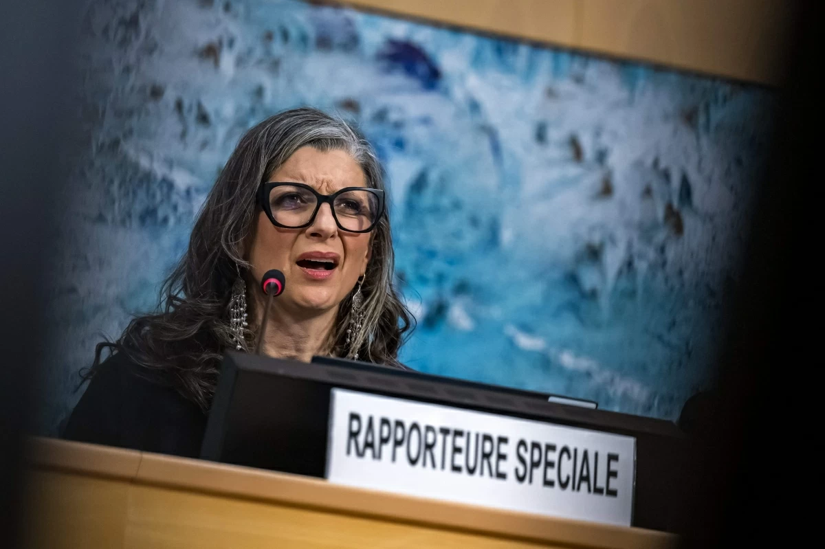 United Nations (UN) special rapporteur on the occupied Palestinian territories Francesca Albanese presents her latest report before delegates at the UN Rights Council, in Geneva, on March 23, 2026 (AFP photo)