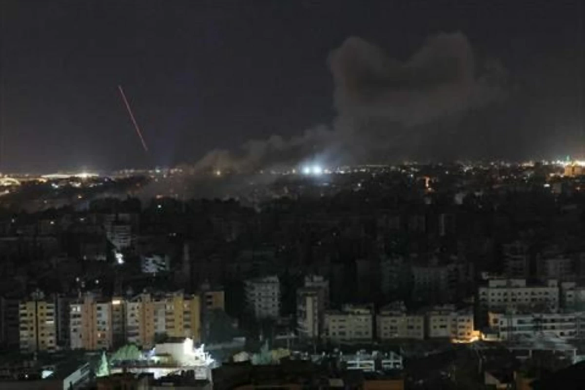 Smoke rises from the site of an Israeli airstrike that targeted an area in Beirut’s southern suburbs on March 27, 2026 (AFP photo)