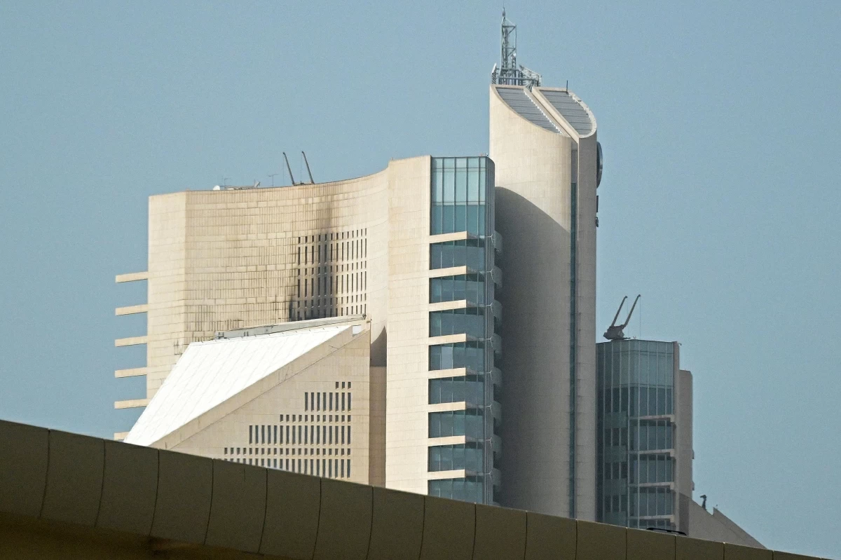 This photograph shows the impact of a fire caused by a drone attack on a building of the Kuwait Petroleum Corporation (KPC), in Kuwait City on April 5, 2026 (AFP photo) 