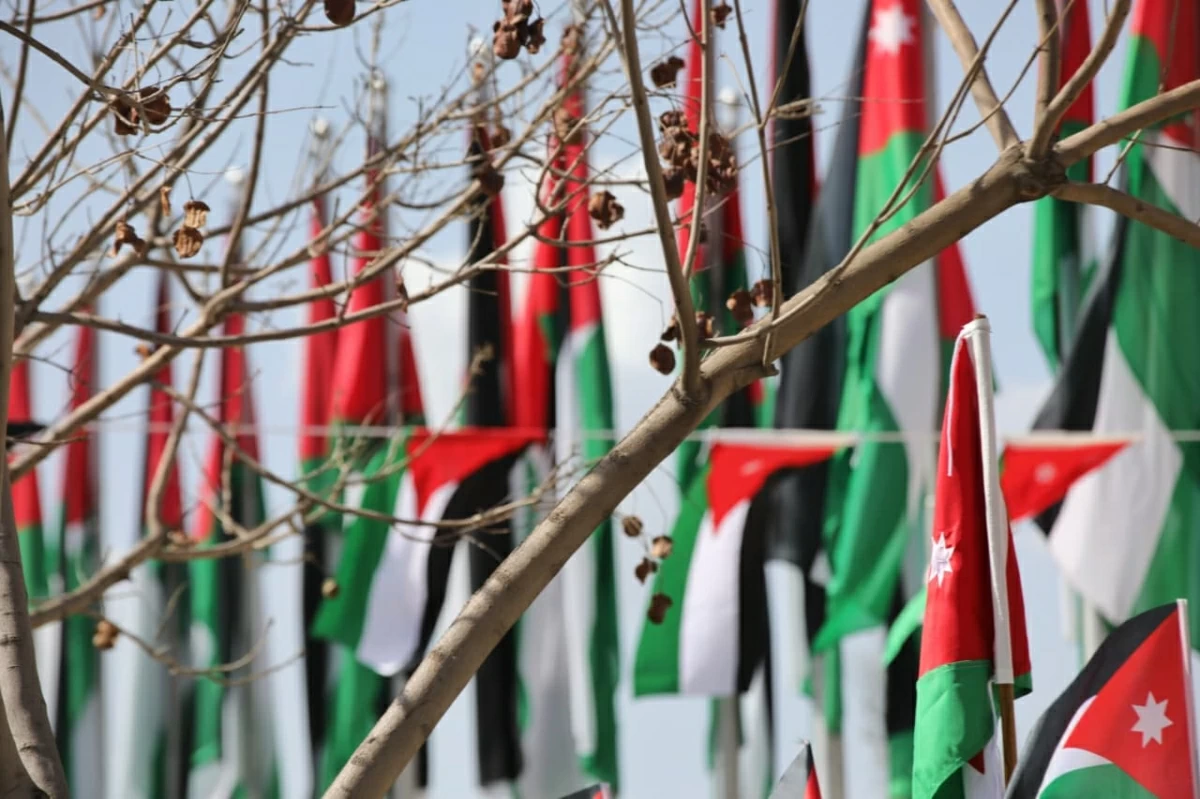 Jordanians on Thursday mark the National Flag Day, which was approved by the Council of Ministers as part of Jordan’s centennial celebrations. The occasion aims to showcase Jordanians’ pride in their country, symbolised by the flag, which is testament to the sacrifices of Jordanians in the march towards progress and prosperity (Photos by Ahmad Khlifat)