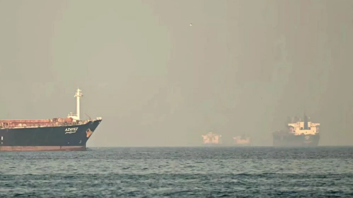The Strait of Hormuz, pictured here before the conflict, has been paralysed by the Iran war (AFP photo)