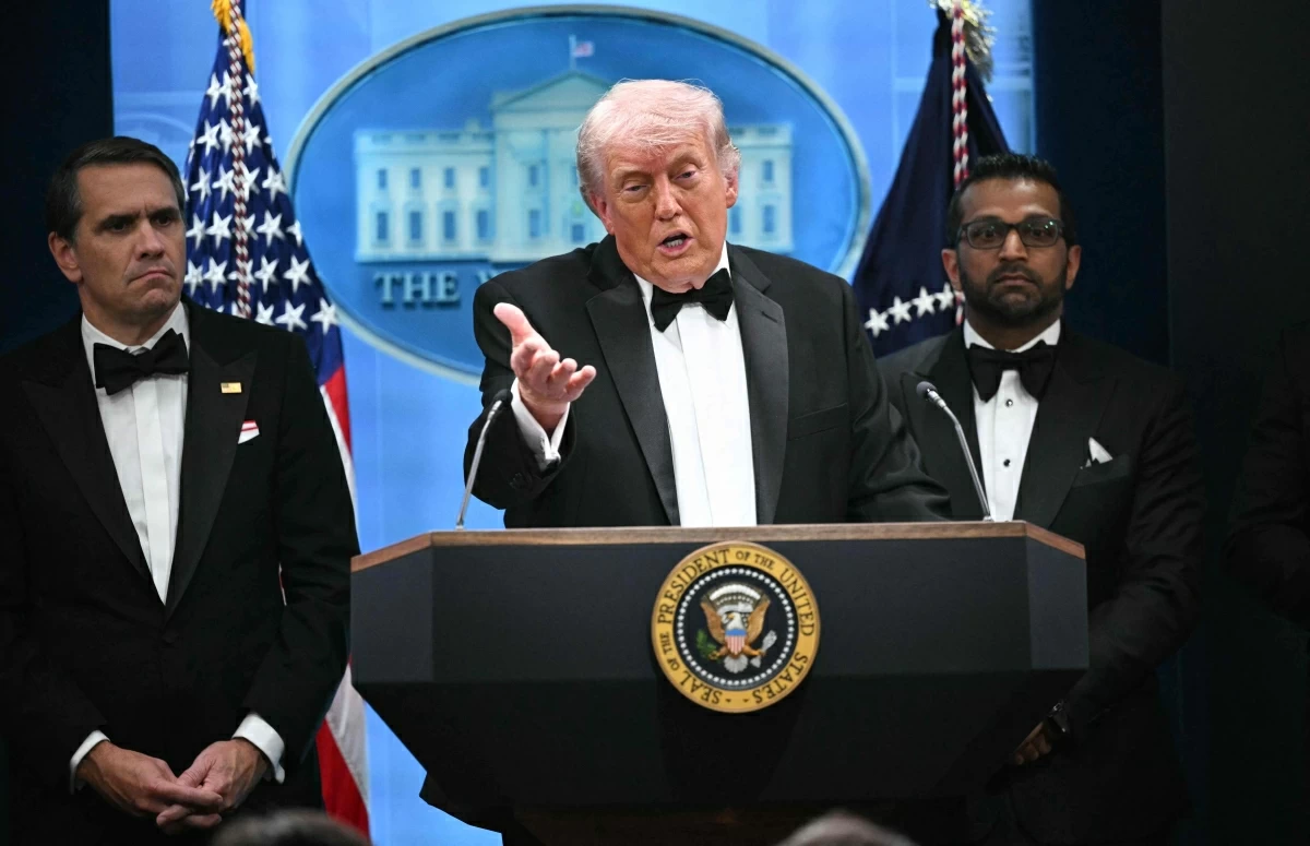 US President Donald Trump speaks flanked by FBI Director Kash Patel and acting Attorney General Todd Blanche during a press briefing in the Brady Briefing Room at the White House in Washington, DC, shortly after a shooting incident at the White House Correspondents’ Dinner on April 25, 2026 (AFP photo)