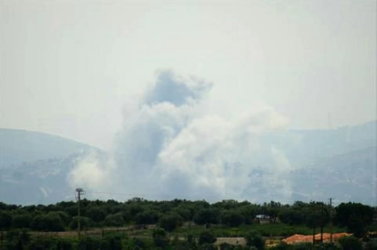Smoke rises from the site of an Israeli airstrike that targeted the southern Lebanese village of Yohmor on May 1, 2026 (AFP photo)