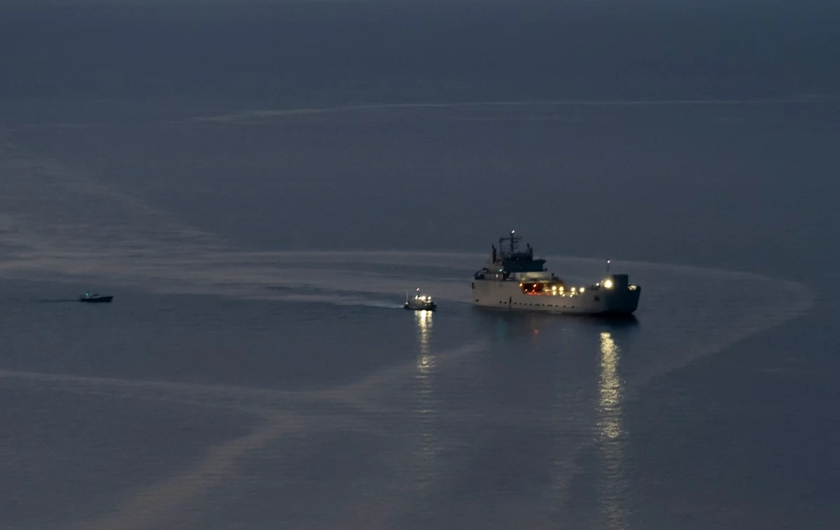 A Greek Coast Guard vessel carrying activists from the Global Sumud Flotilla, which had been intercepted by the Israeli Navy in international waters, arrives at the port of Atherinolakkos on the island of Crete, on May 1, 2026
(AFP photo)
