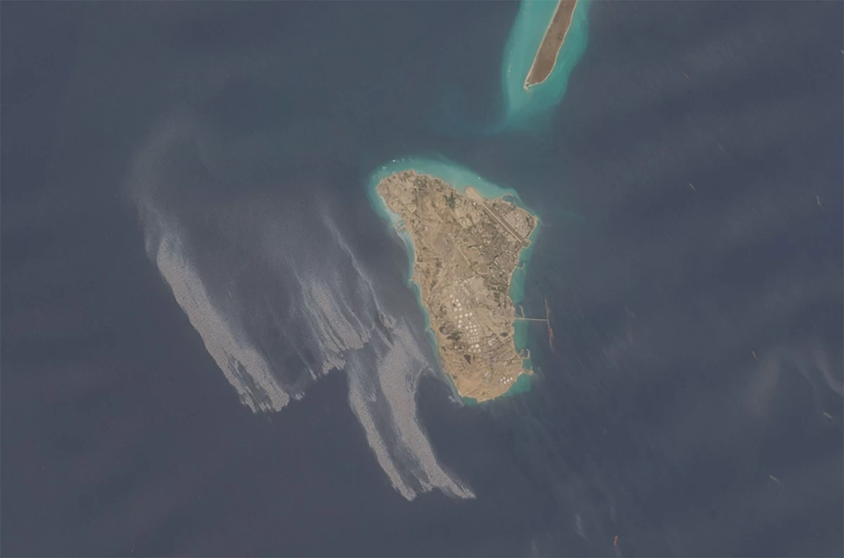 This satellite image obtained from Copernicus Sentinel Data 2026 on May 8, 2026, appears to show an oil slick spreading off the coast of Kharg Island, a key oil export terminal for Iran (AFP photo)