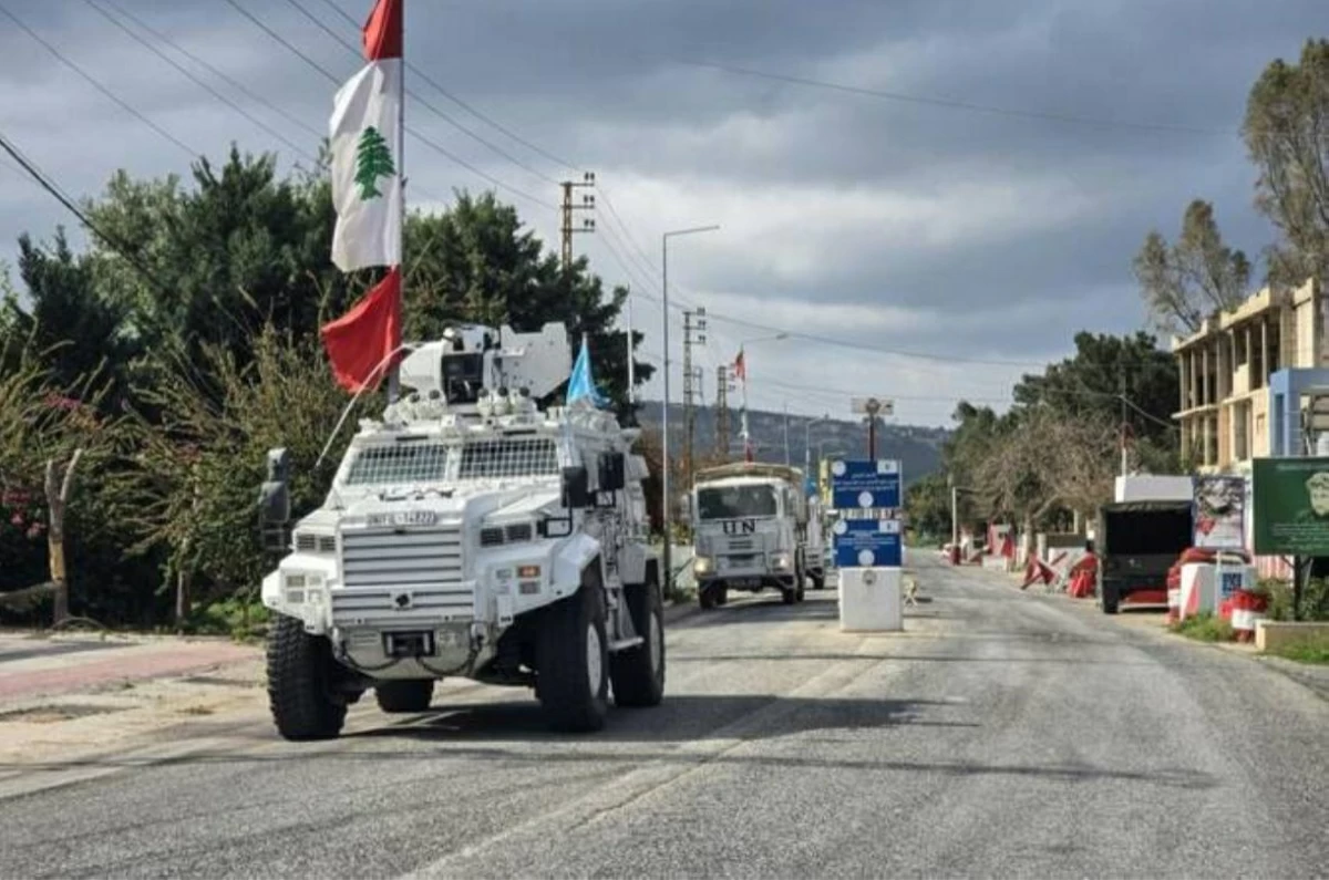 United Nations peacekeepers with the UN Interim Force in Lebanon (UNIFIL) drive past a Lebanese army outpost in the area of Naqura in southern Lebanon on March 27, 2026 (AFP photo)