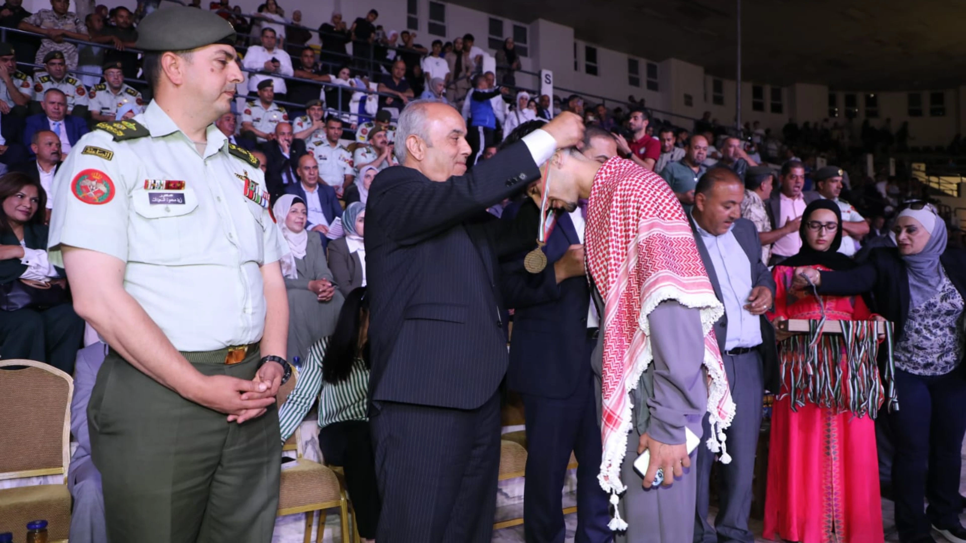 Minister of Education Azmi Mahafzah on Thursday honours winners of the 20th edition of the King Abdullah II Fitness Award (Petra photo)
