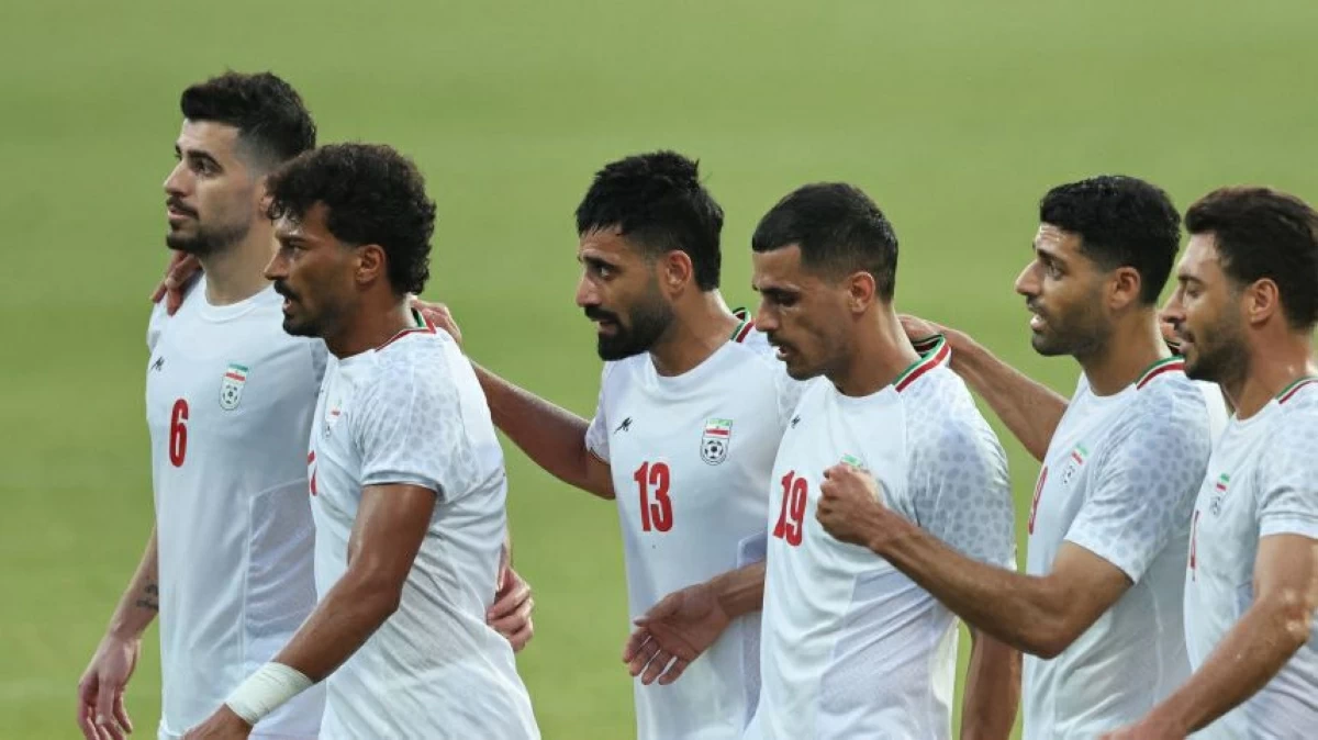Iran forward Ramin Rezaeian celebrates with teammates after scoring their second goal during an international friendly against Gambia in Antalya, southern Turkey on May 29, 2026, as part of Iran's preparation for the upcoming FIFA World Cup (AFP photo)
