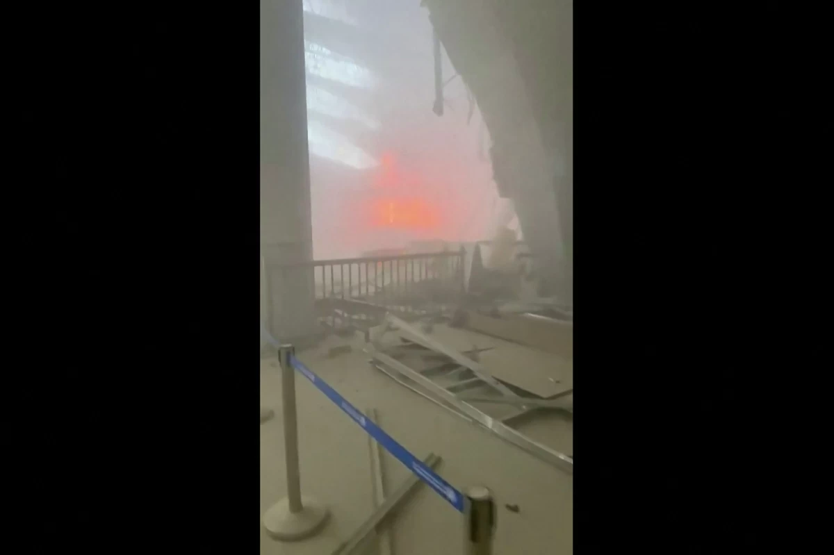 This video grab taken from UGC images posted on social media on June 3, 2026, appears to show damage at Kuwait's international airport following an attack (AFP Photo)