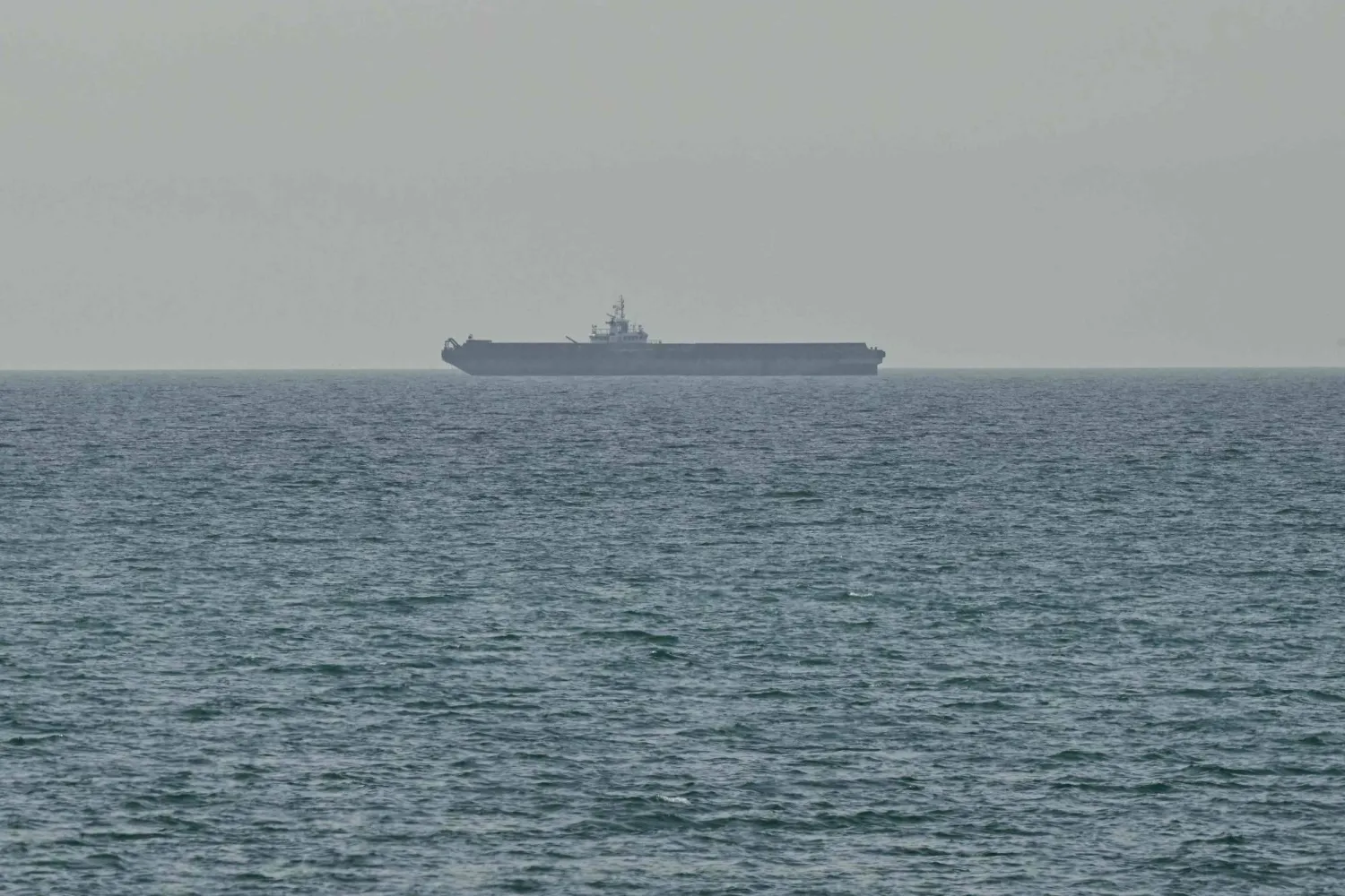 A ship is seen off the coast of Ras al-Khaimah, UAE on April 13, 2026 (AFP photo)