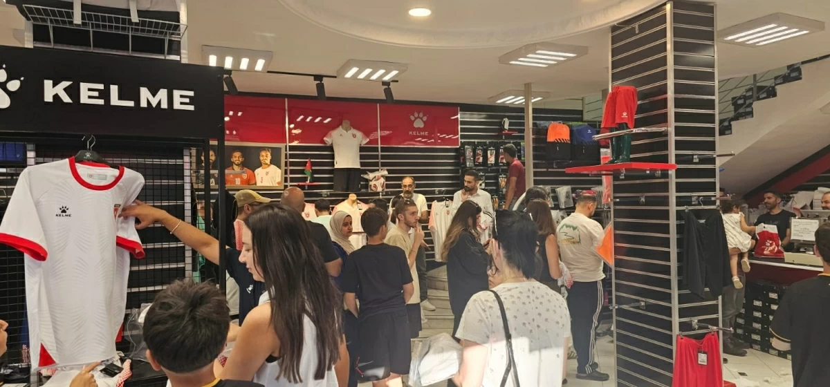 Dozens of fans on Tuesday queue inside one of Amman’s main shops selling the national football team’s jerseys ahead of Jordan’s historic debut in the FIFA World Cup 2026 (Photo by Rana Husseini)