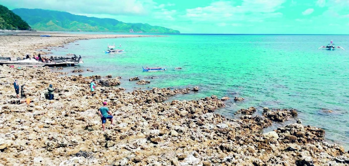 This photo taken on Thursday, shows an aerial photo of the coastal uplift following an earthquake along the Pangyan Marine Sanctuary in Glan, Sarangani (AFP photo)