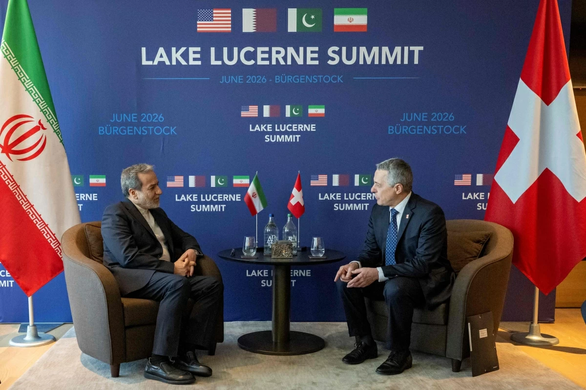 Iran's Minister of Foreign Affairs Seyyed Abbas Araghchi (L) and Swiss Federal Council, Ignazio Cassis take part in bilateral discussions at the Burgenstock resort in Obbuergen, near Lucerne on June 21, 2026 (AFP photo)