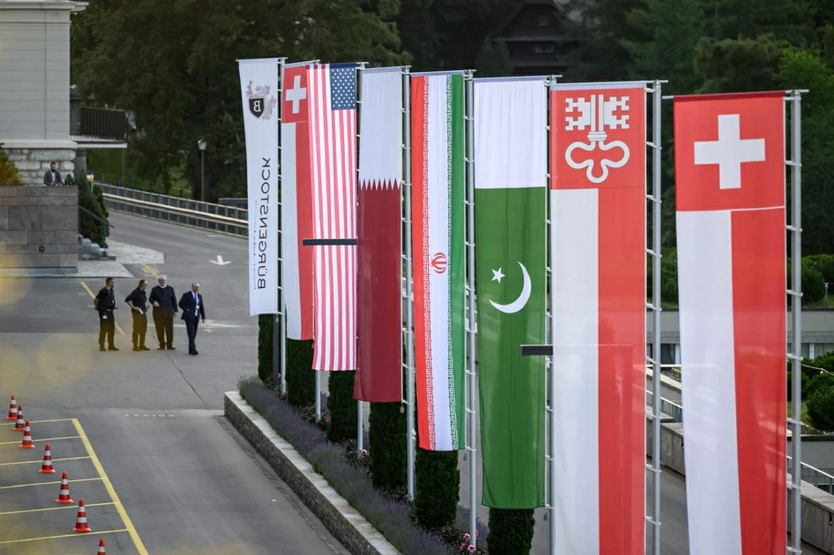 Flags of Switzerland, United States, Qatar, Pakistan and local Swiss canton of Nidwalden are photographed at the Burgenstock luxury hotel complex overlooking Lake Lucerne, Switzerland, on June 21, 2026, ahead of high-level talks 
(AFP photo)