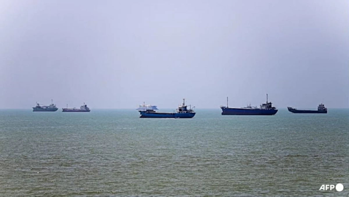 In this picture obtained from Iran's ISNA news agency on Jun 18, 2026, vessels are seen anchored in Bandar Abbas along the Strait of Hormuz
(AFP photo)