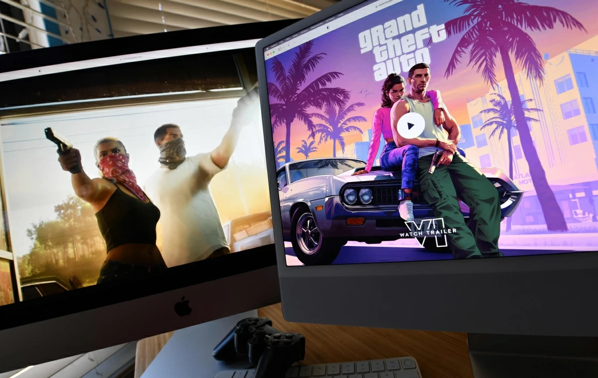 This illustration photo created in Los Angeles, California, on December 5, 2023, shows Rockstar Games’  Grand Theft Auto 6 trailer played on computer screens (AFP photo)