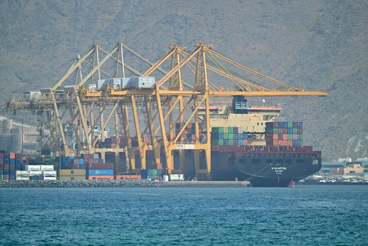 The Marshall Island flagged container vessel K Klaipeda is seen docked along a pier at the Khor Fakkan Container Terminal in Sharjah Emirate, along the Gulf of Oman on June 28, 2026 (AFP photo)
