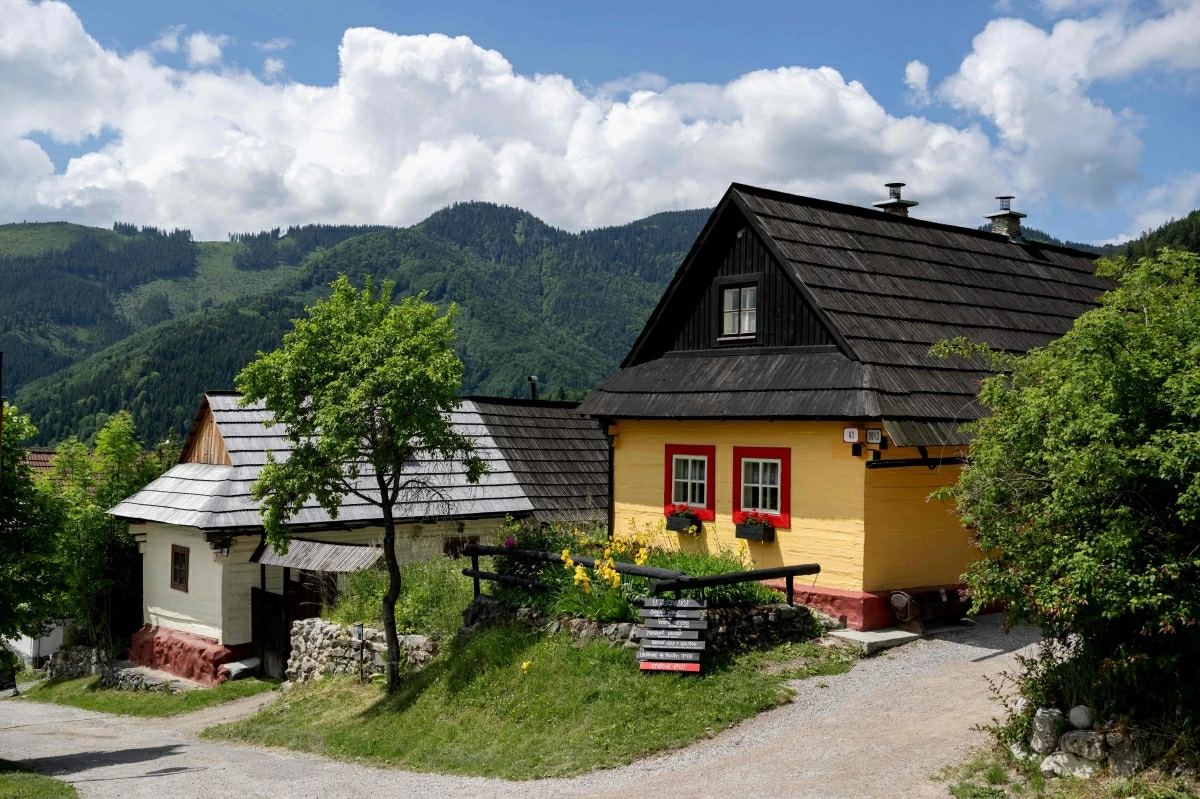 Traditional log houses are seen at the UNESCO-listed Slovak village of Vlkolinec, near the Central Slovakian town of Ruzomberok on June 6 (AFP photo)