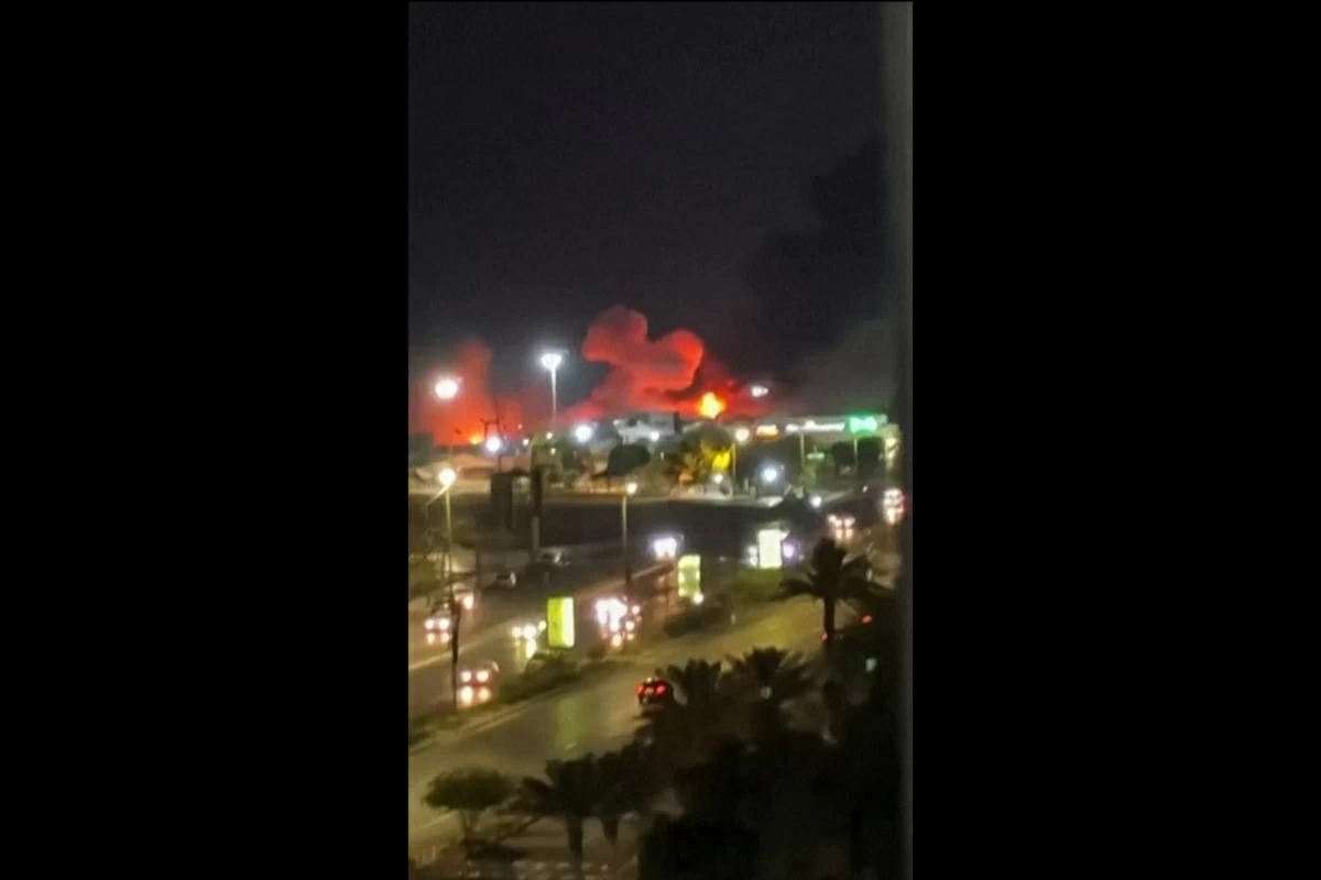 This frame grab made from a UGC video footage of an unknown source posted on social media on July 8 show explosions going off in Iran's major port city of Bandar Abbas (AFP photo) 
