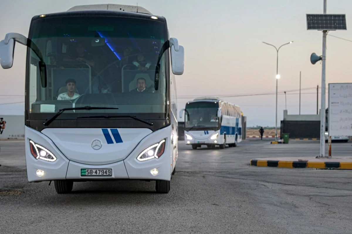 Buses transport 26 children from Gaza back to the Strip via the King Hussein Bridge on Wednesday after they completed treatment in Jordanian hospitals as part of Jordan's 