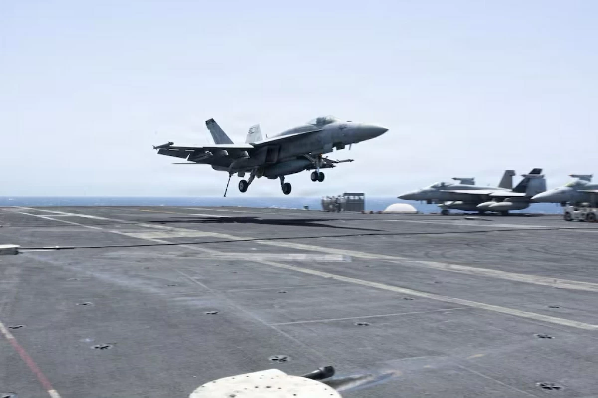 An F/A-18F Super Hornet lands on the flight deck of Nimitz-class aircraft carrier USS George H.W. Bush while sailing in the Arabian Sea, May 26, 2026. ( US Navy/AFP)