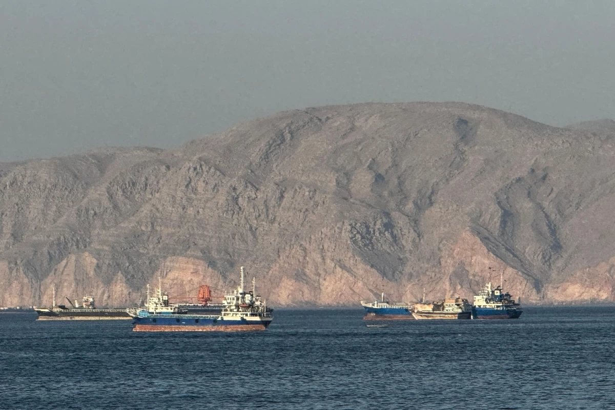Vessels are seen anchored in the Strait of Hormuz, off the port city of Khasab on Oman’s northern Musandam Peninsula on May 17, 2026 (AFP photo) 