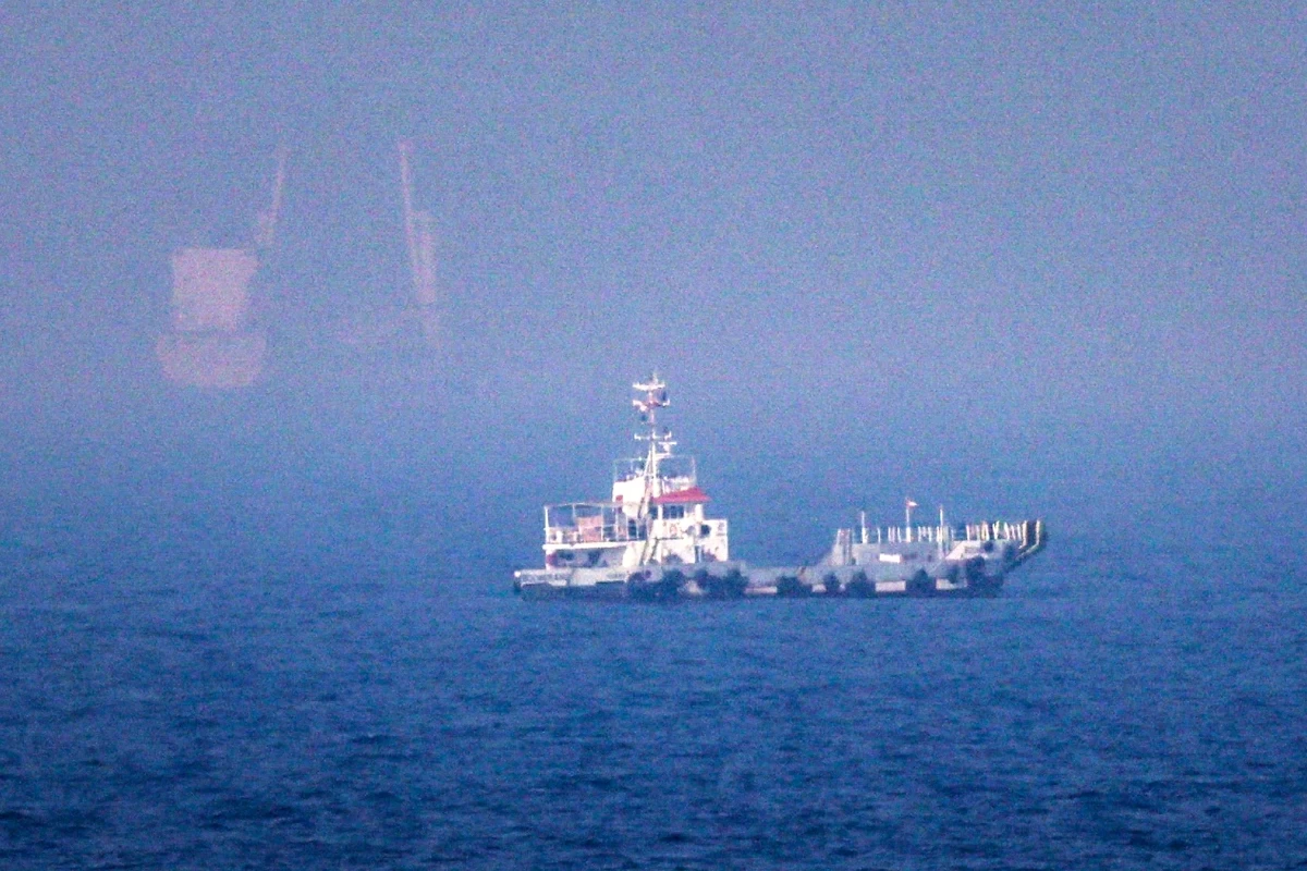 This picture shows ships sailing near the Strait of Hormuz off the eastern coast of the United Arab Emirates at Khor Fakkan on July 13, 2026
(AFP photo)