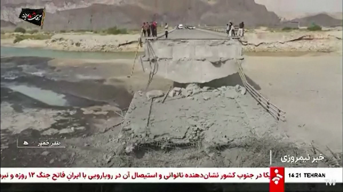 This screen grab taken from video footage broadcast by Iran's IRINN state television network and made available via AFPTV on July 17, 2026, shows what the network says is the aftermath of overnight US strikes on two bridges in Bandar Khamir County, near the Strait of Hormuz (AFP photo)