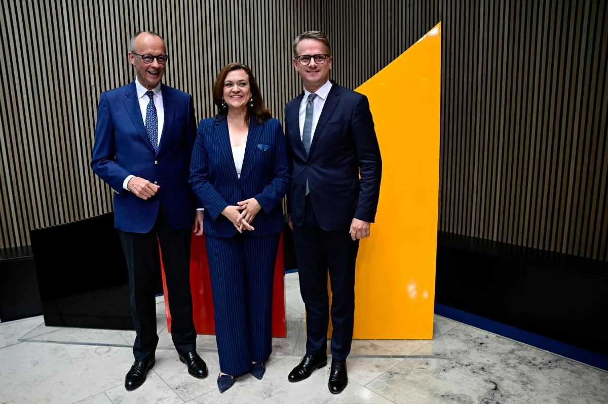 From left to right: German Chancellor and CDU Chairman Friedrich Merz, designated CDU Secretary General Franziska Hoppermann and designated German Health Minister Carsten Linnemann in Berlin on Tuesday (AFP photo)