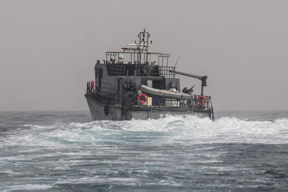 A vessel of the navy of Yemen's Aden-based internationally recognised government patrols a shipping lane off Hanish Island in the Red Sea on July 27, 2026 (AFP photo)