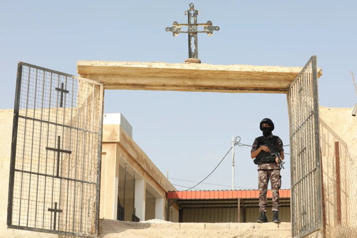 A police officer is seen at the entrance to Hmoud village in Karak (Al Mamlaka photo)