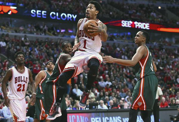 Bulls' Mike Dunleavy hit Bucks' Michael Carter-Williams with hard