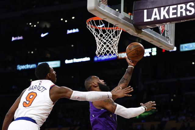 LeBron James of the Miami Heat rises for a dunk against the Los