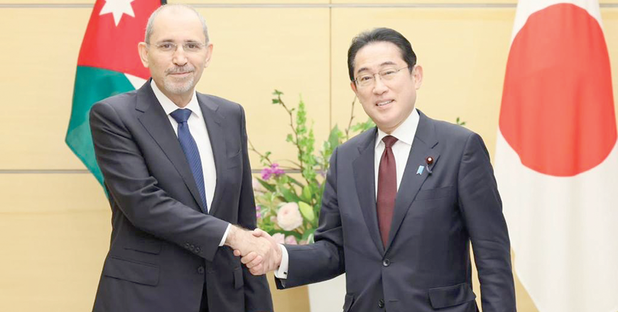 Deputy Prime Minister and Foreign Affairs Minister Ayman Safadi with Japanese Prime Minister Fumio Kishida in Tokyo on Tuesday (Photo courtesy of Foreign Minstry)