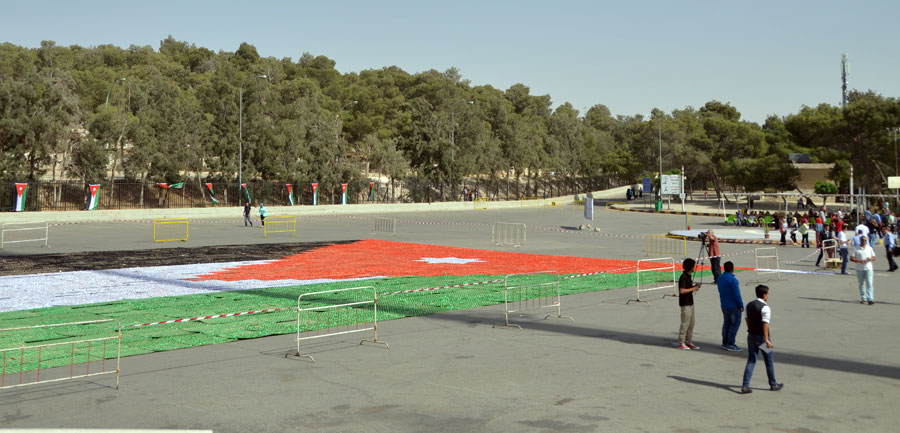 A Jordanian flag, created using the Japanese art of folding paper, broke the Guinness World Record for the largest origami mosaic on Monday (Photo by Muath Freij)