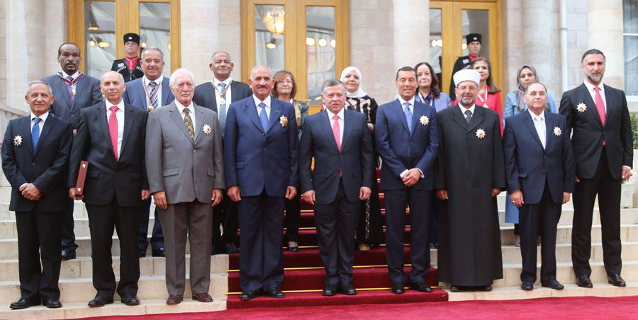 His Majesty King Abdullah with the recipients of Royal medals at a national celebration marking Independence Day on Monday (Photo courtesy of Royal Court)