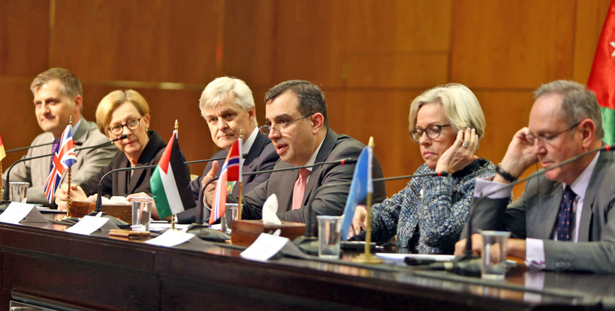 Minister of Planning and International Cooperation Imad Fakhoury meets with envoys of donor countries over response to Syrian refugee crisis in Amman on Monday (Petra photo)